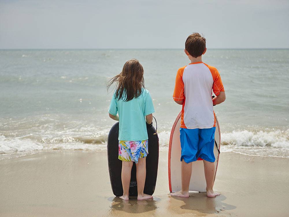 Kids with boogie boards at JELLYSTONE PARK CHINCOTEAGUE ISLAND