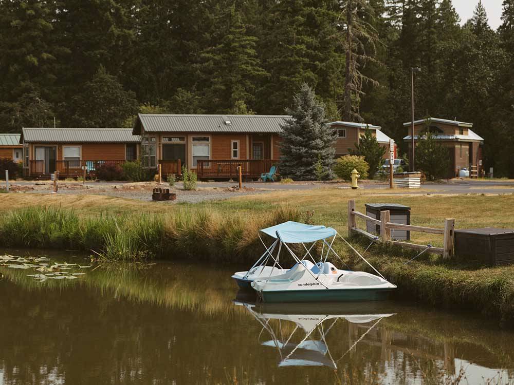 A paddle boat on the water at SILVER COVE RV RESORT