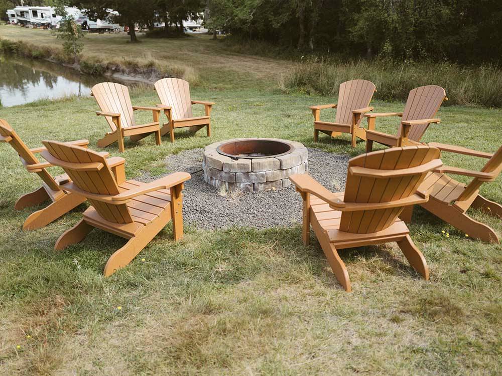 Chairs around the fire pit at SILVER COVE RV RESORT