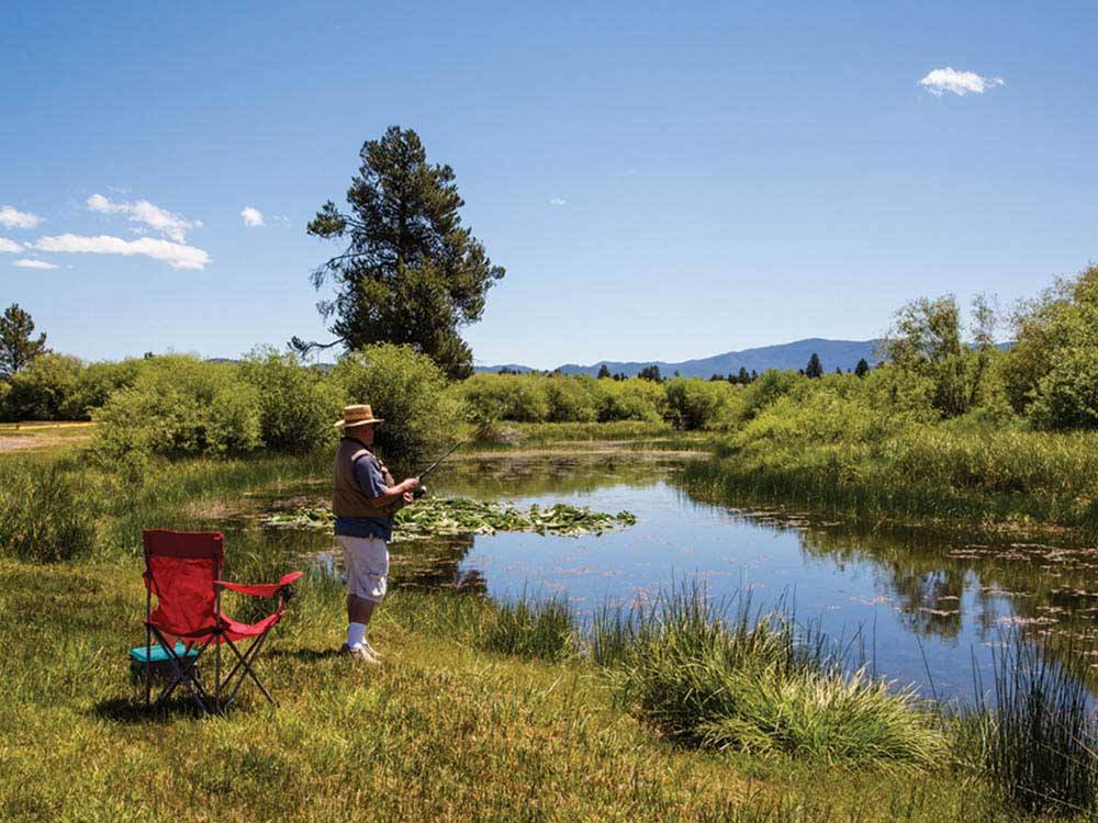 Man fishing at THOUSAND TRAILS BEND-SUNRIVER