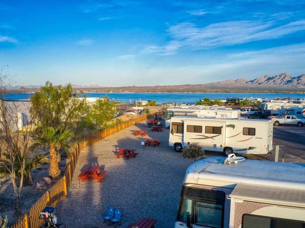 A row of RV sites with picnic benches at CAMPBELL COVE RV RESORT