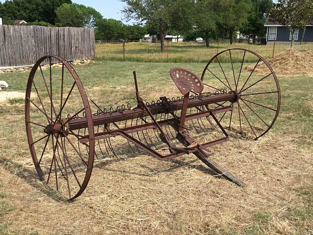 An old piece of farming equipment at EAST VIEW RV RANCH