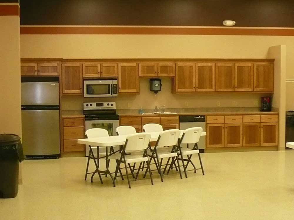 Kitchen area in lodging at DEER CREEK VALLEY RV PARK