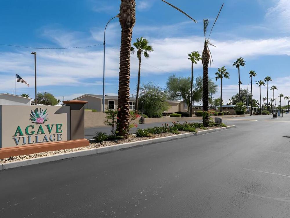 A view of the sign at Agave Village RV Resort