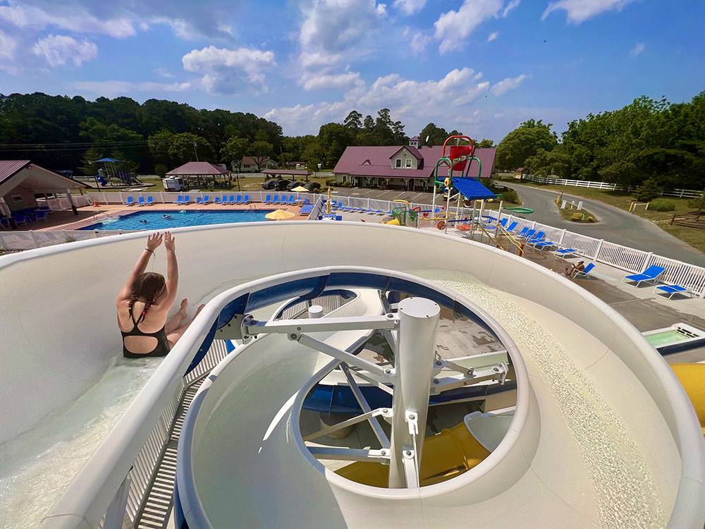 A girl going down the water slide at YOGI BEAR'S JELLYSTONE PARK AT DELAWARE BEACH