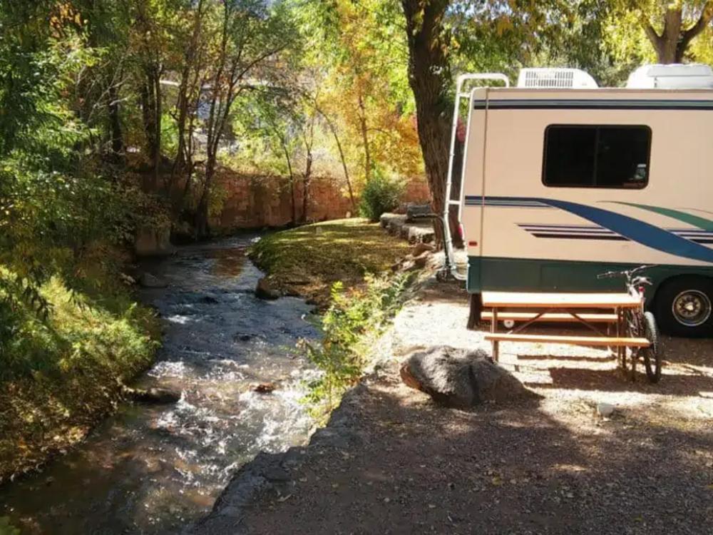 RV parked along the water at Pikes Peak RV Park & Campground