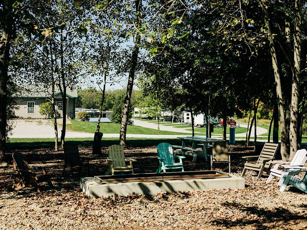 Chairs around a fire pit at Timbercrest Camp and RV Park