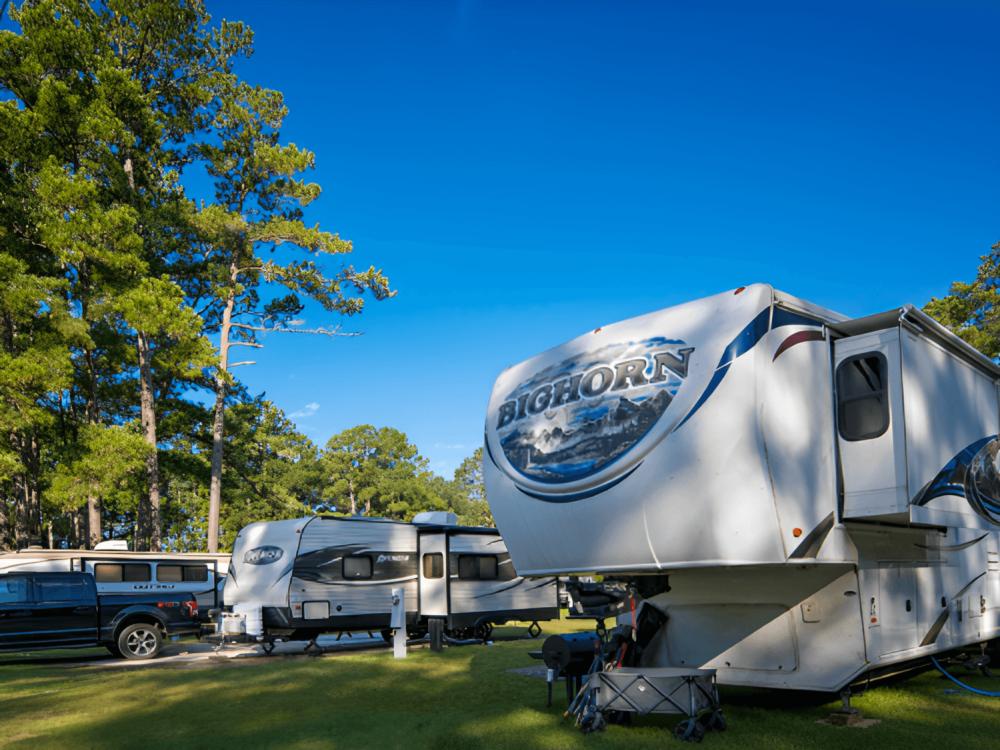 RV's parked at site Bass Lake RV Campground