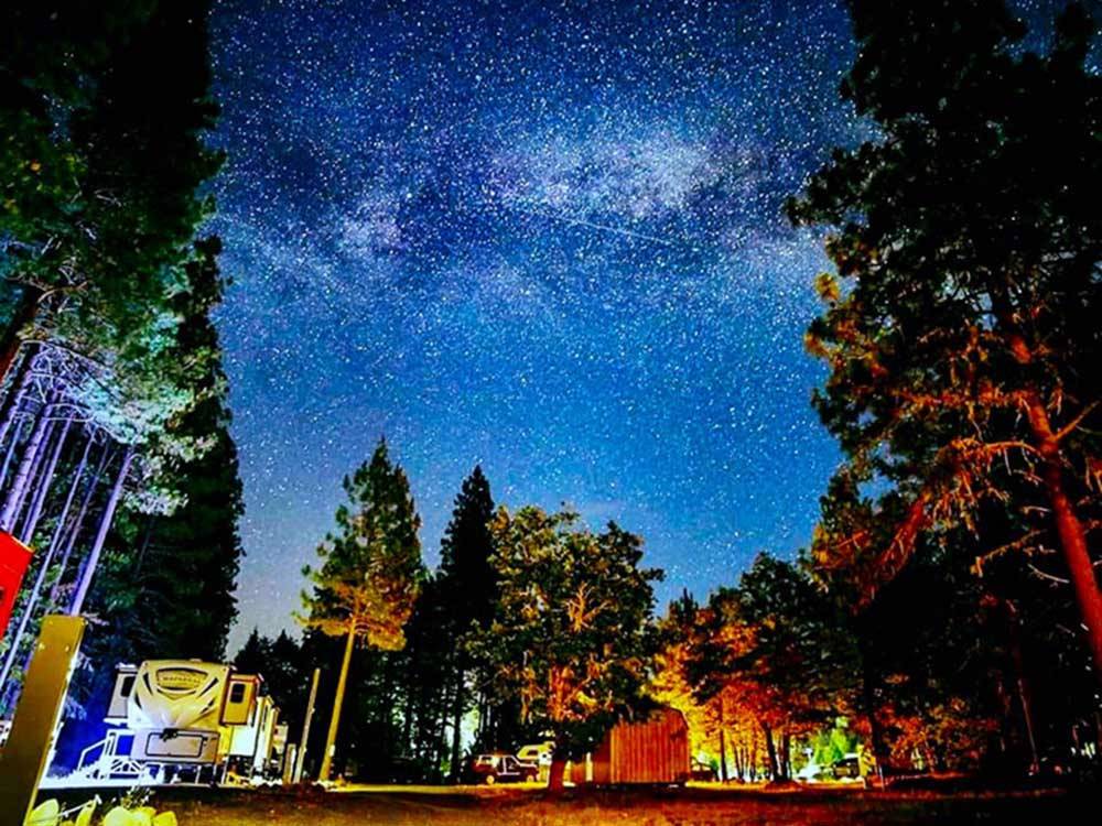 Trailers parked under the starlight at LONE MOUNTAIN RESORT