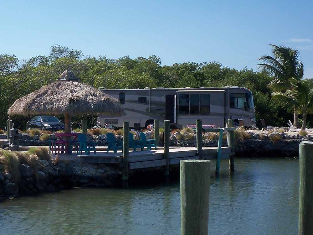 A RV site on the water at GRASSY KEY RV PARK AND RESORT