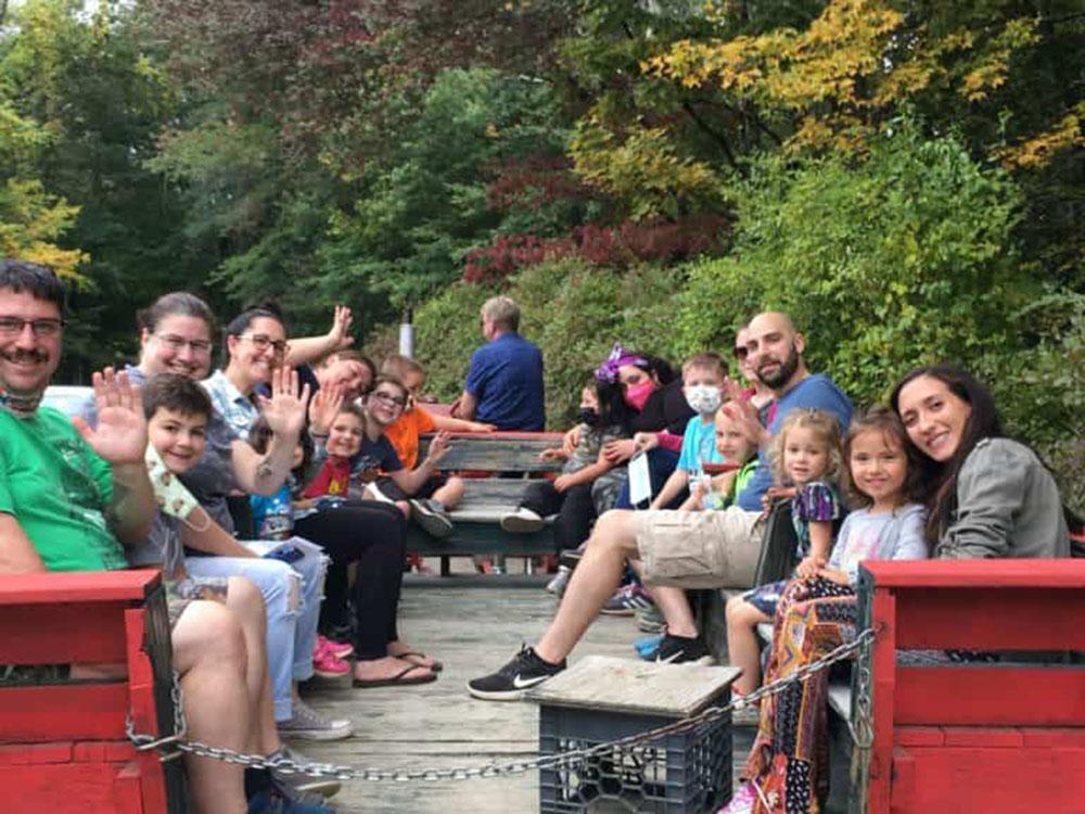 Guest enjoying a hayride at WHITE PINES CAMPSITES