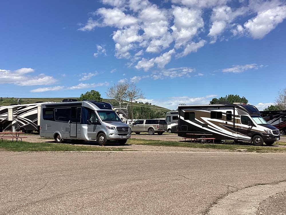 A group of occupied RV sites at GREAT FALLS RV PARK