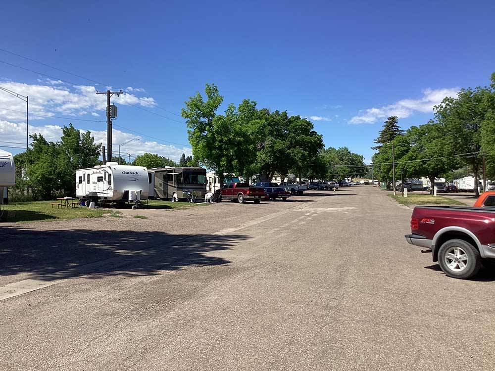 Full RV sites on a road at GREAT FALLS RV PARK