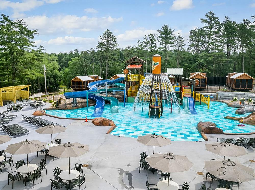 Pool area at site Cranberry Acres Jellystone Park