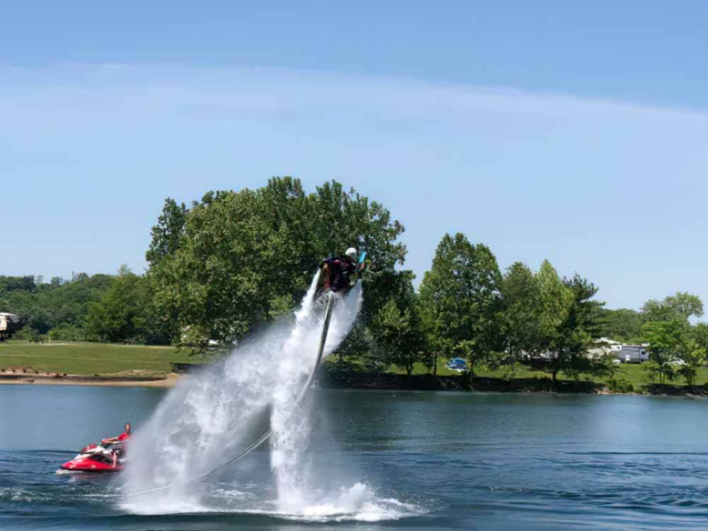 A man with a water jet at LAKEVIEW RV PARK