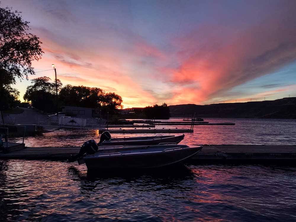 Boats on the water at dusk at COULEE PLAYLAND