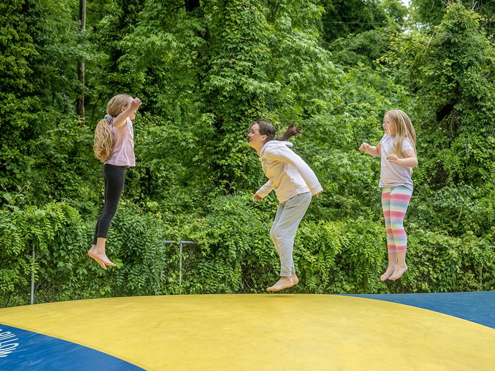 Kids jumping on the bounce pillow at SUN OUTDOORS CAPE MAY