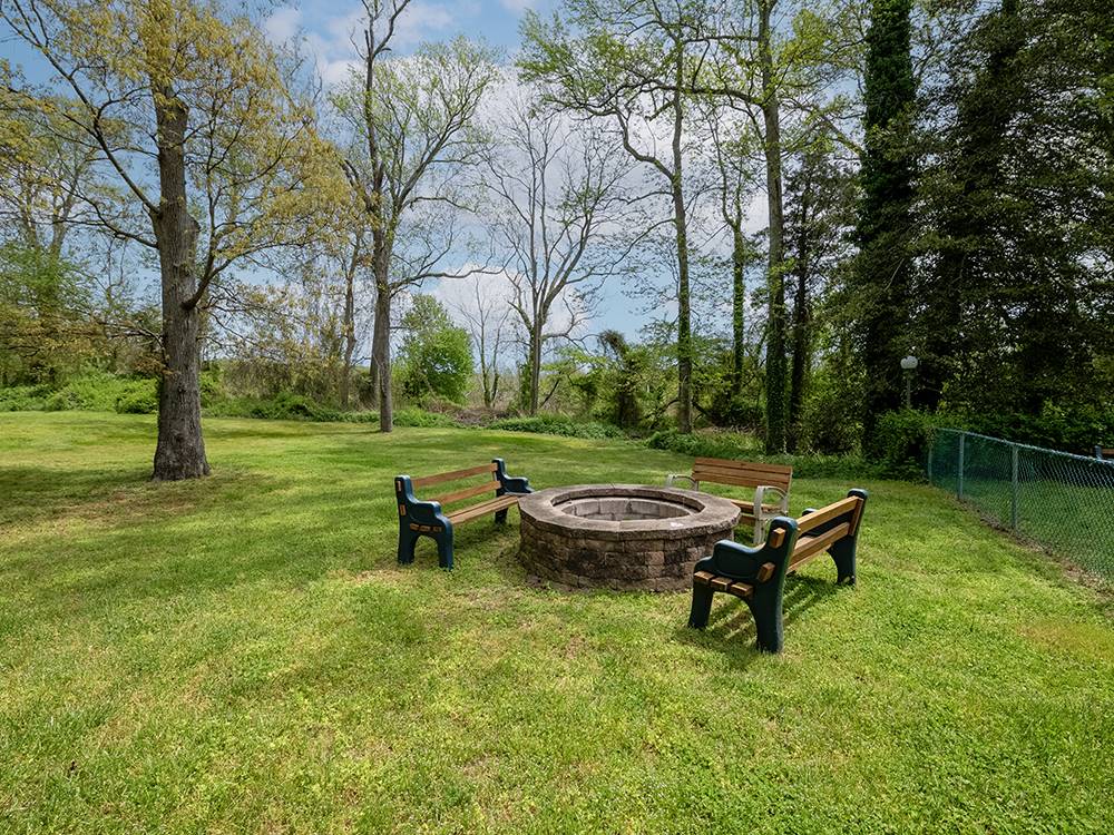 Fire pit with benches at SUN OUTDOORS CAPE MAY