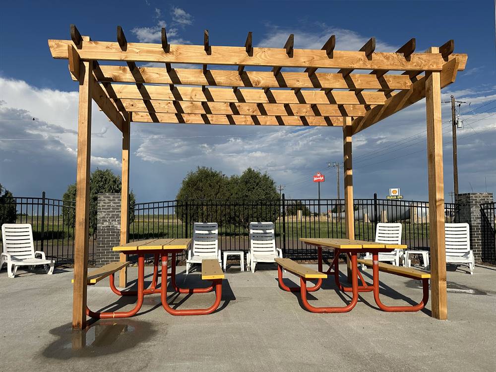 Picnic tables under a pergola