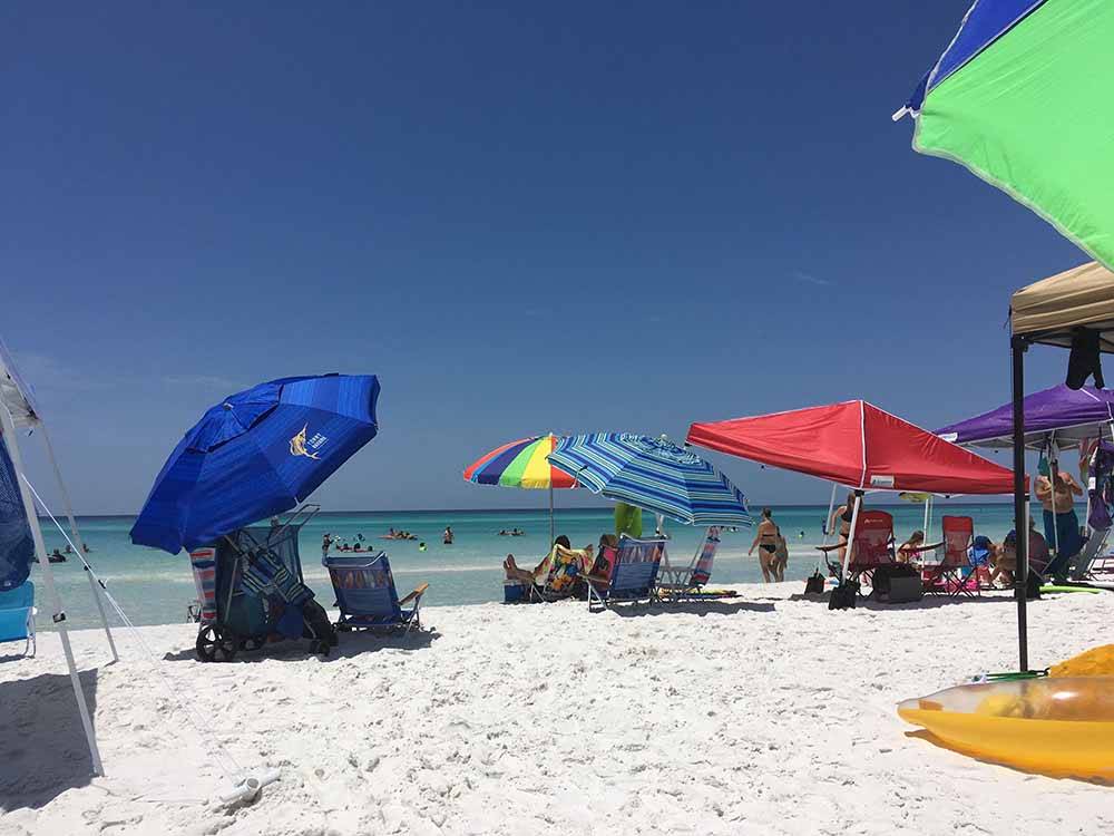 Colorful beach umbrellas  at CAMPING ON THE GULF