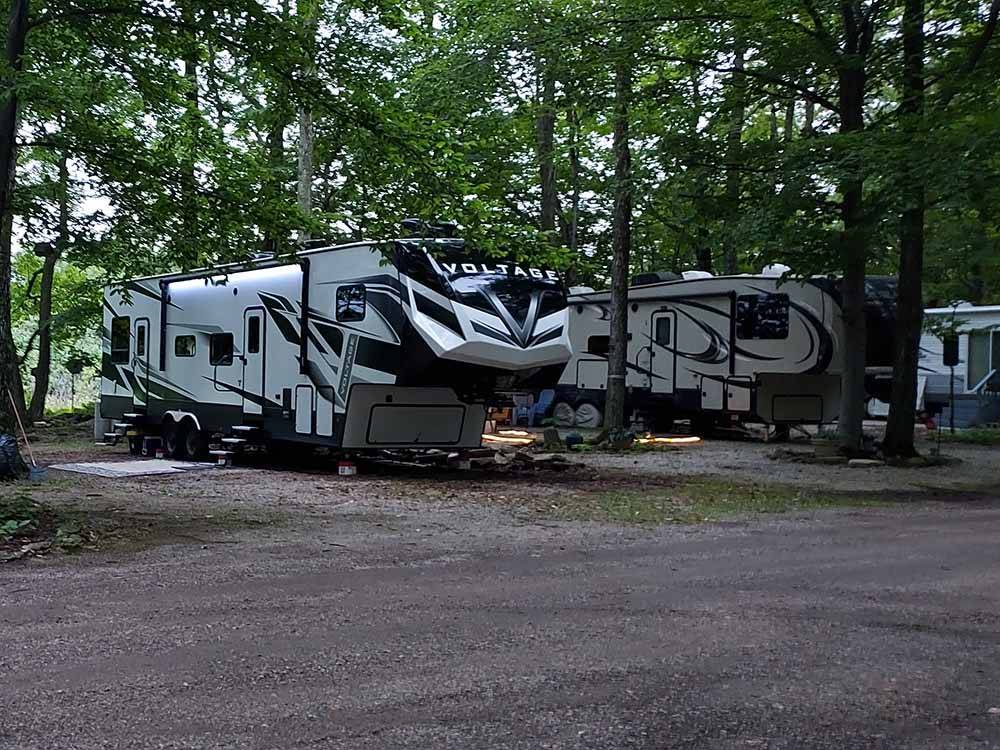 A row of travel trailers in gravel sites at HTR DOOR COUNTY