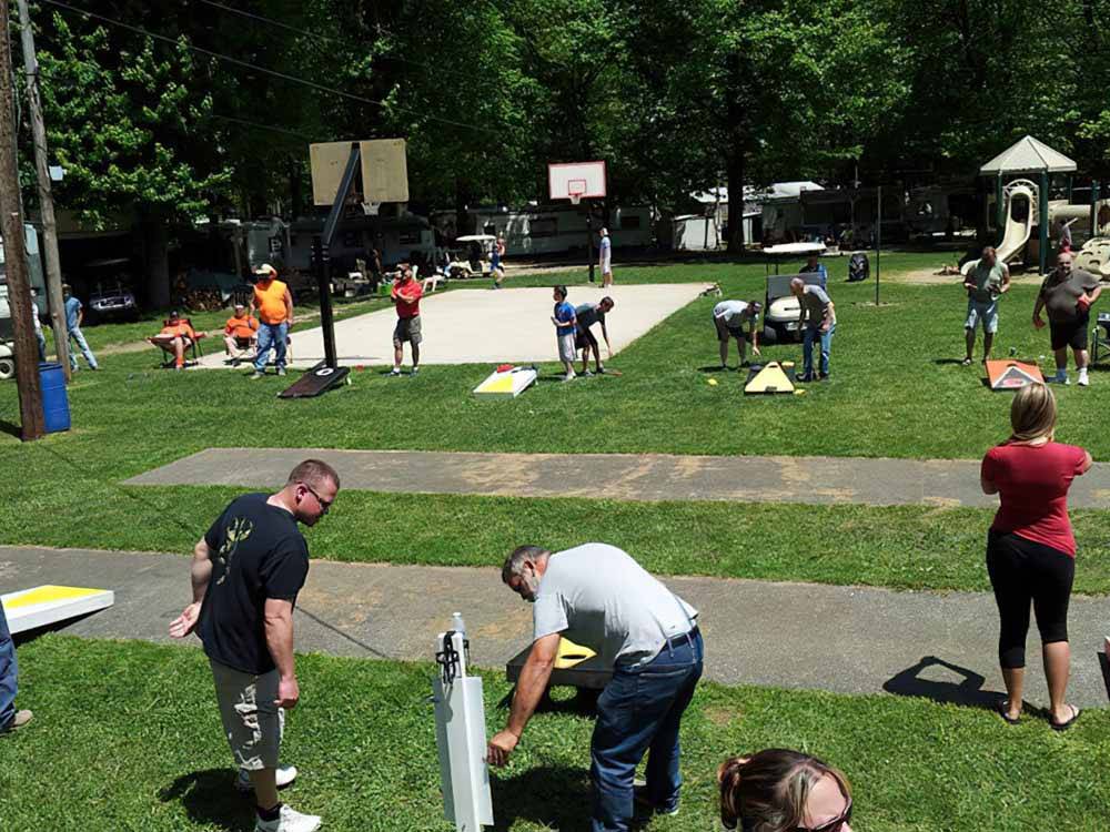 People playing a variety of games at EVERGREEN LAKE PARK