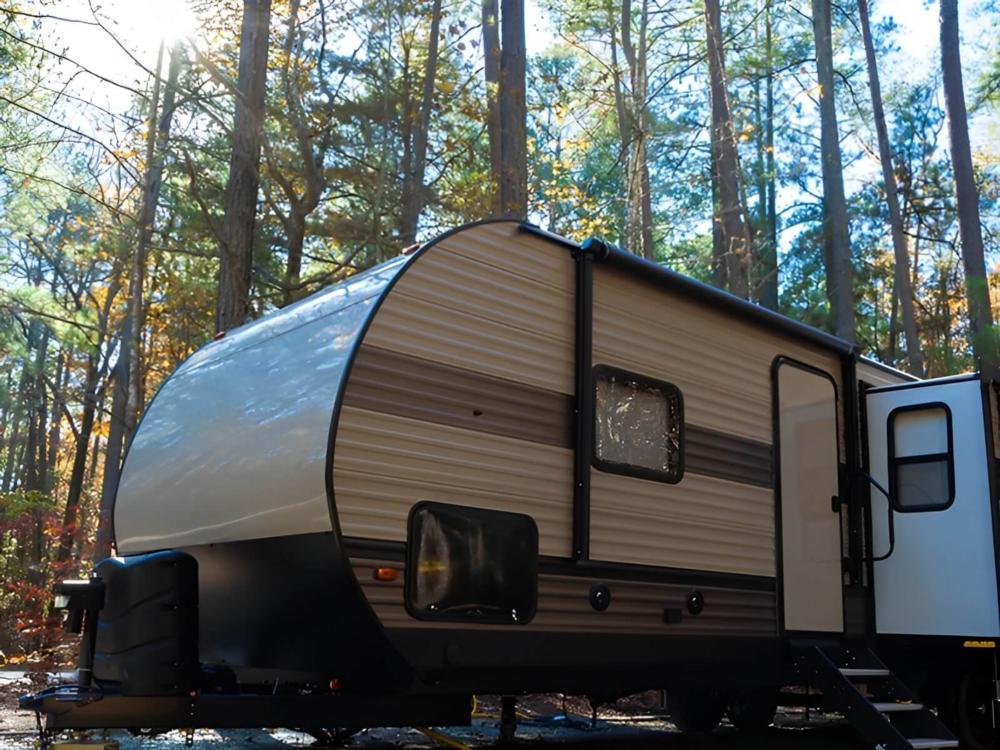 Parked trailer at site Big Mineral Resort, Marina and Campground