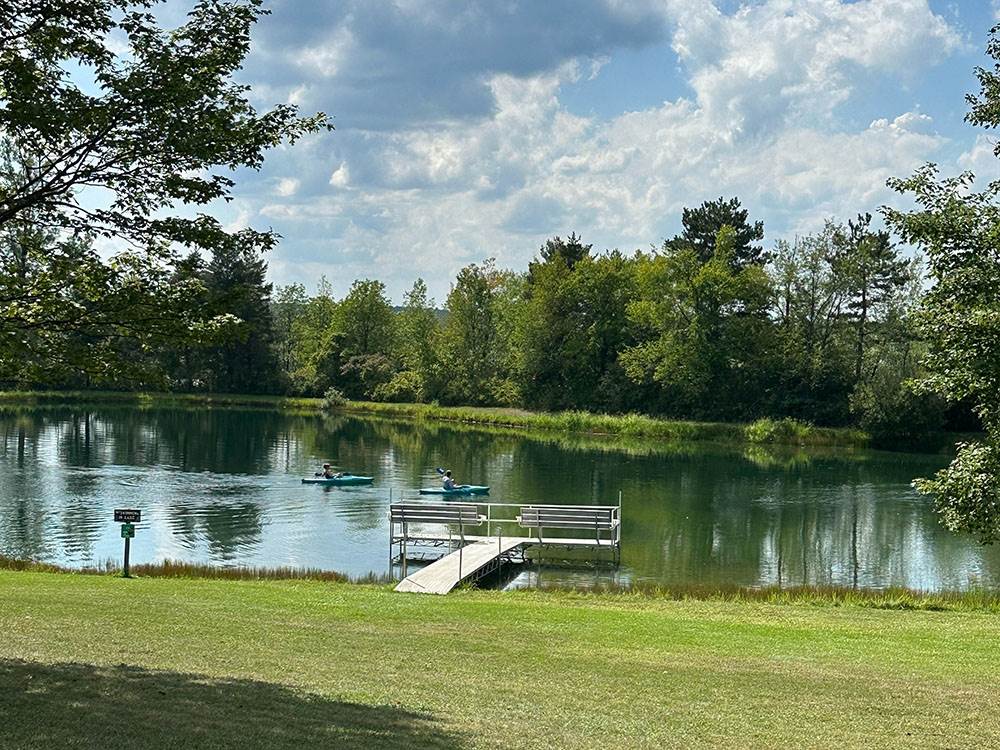 Two kayaks on the pond