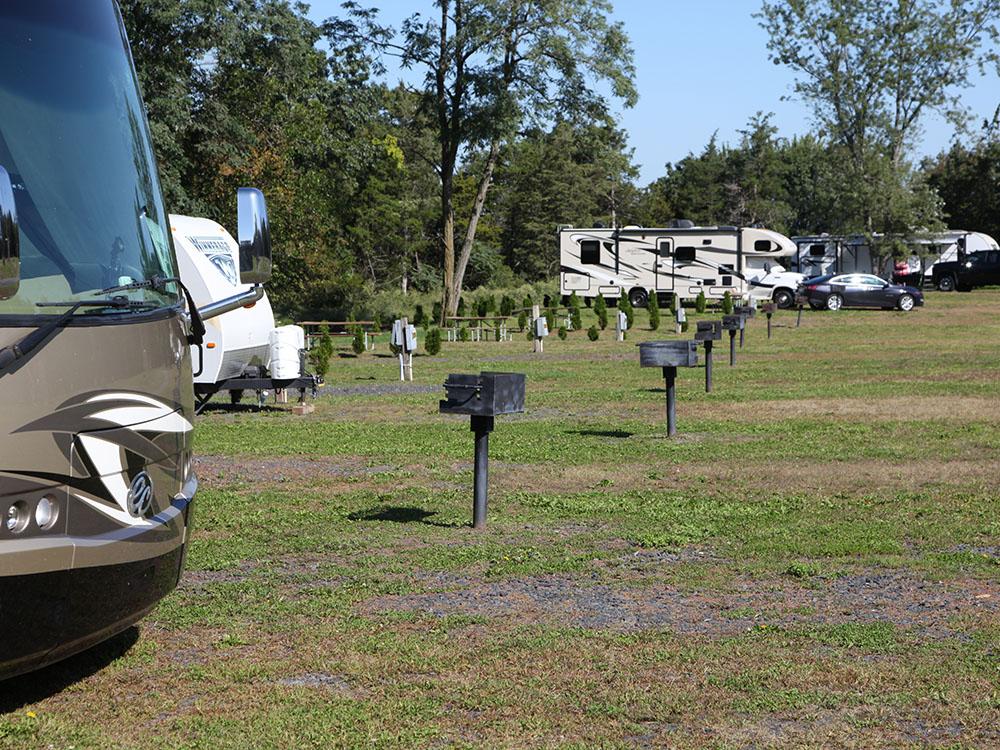 A row of RV sites with fire pits at BLACK BEAR RV PARK