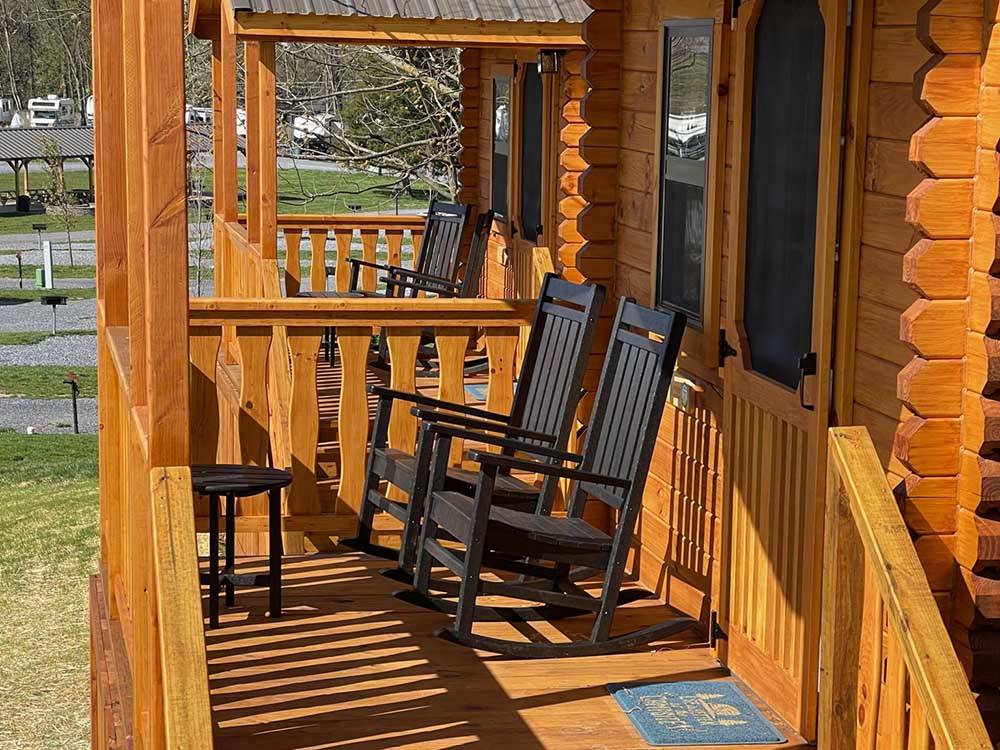 Chairs on porch of rental cabin at HERSHEY ROAD CAMPGROUND