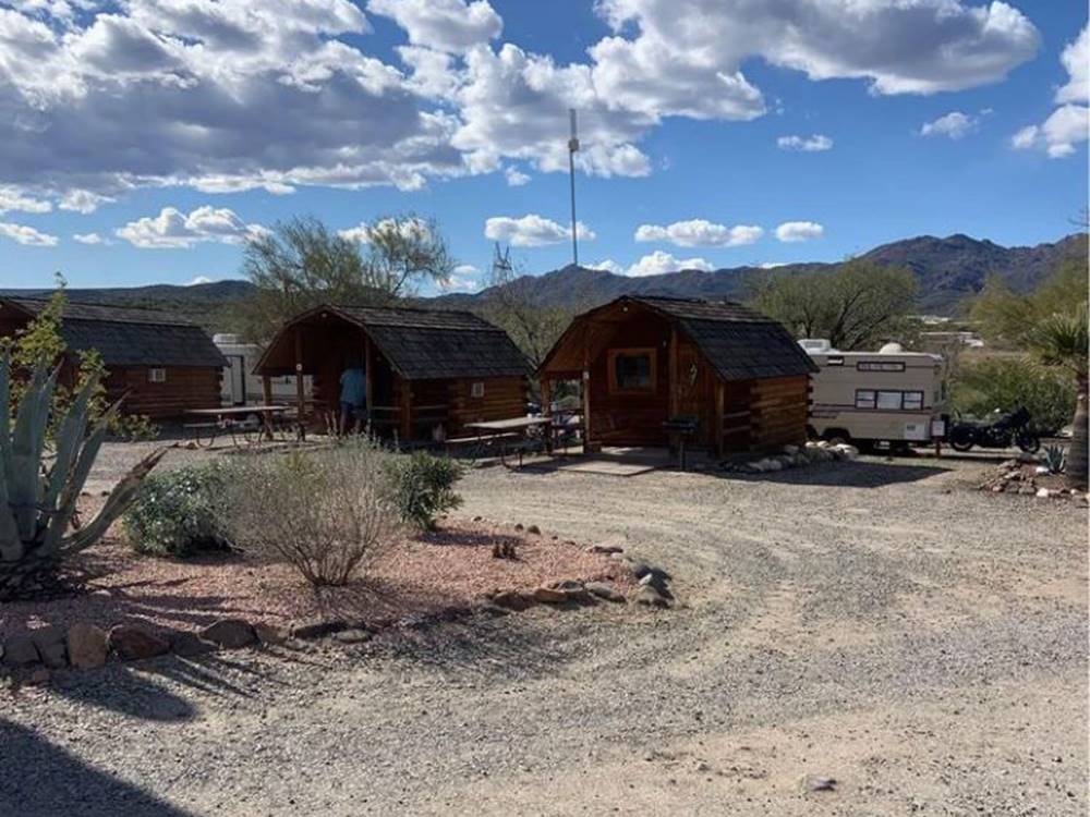 Rental cabins on a gravel road at Black Canyon Campground