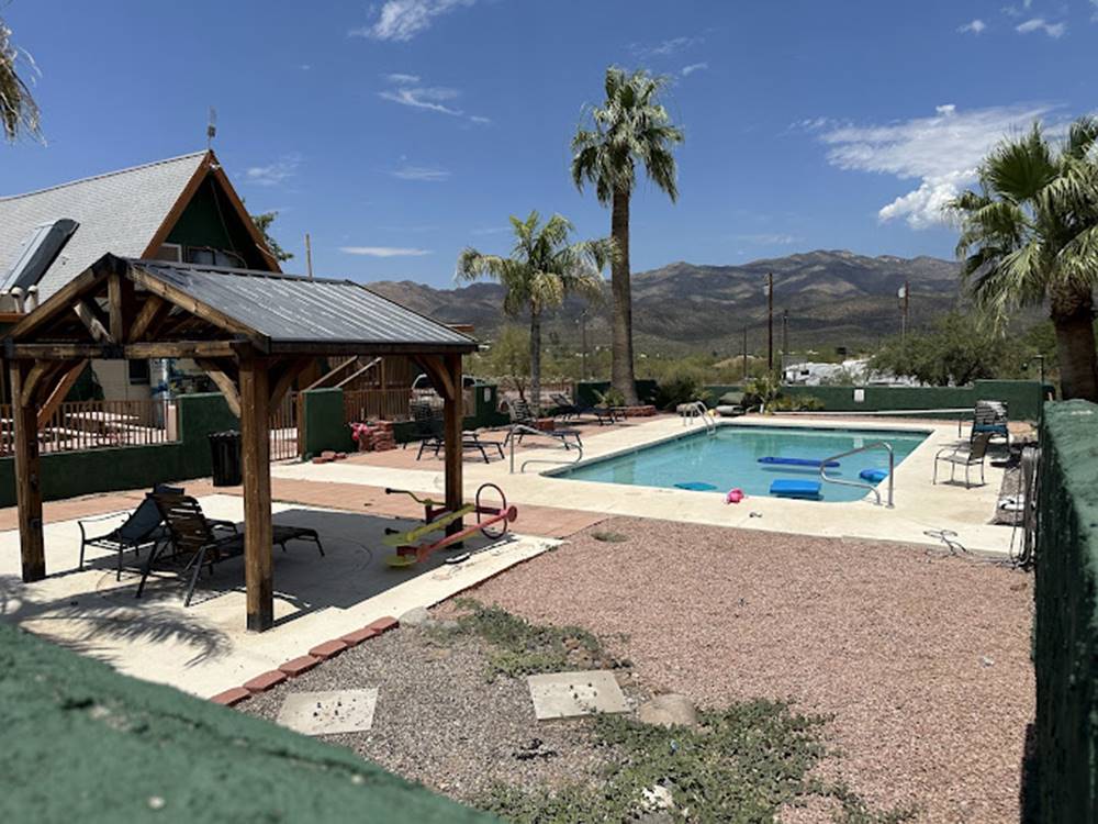 Covered seating area at the pool at Black Canyon Campground