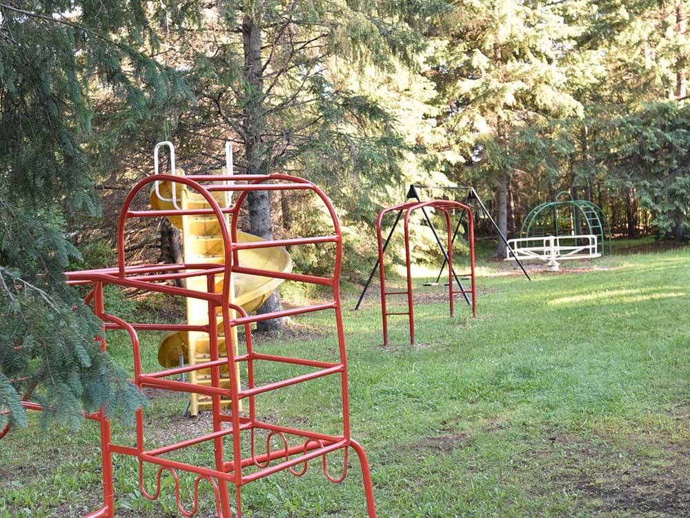 The metal playground equipment at HAPPY LAND RV PARK