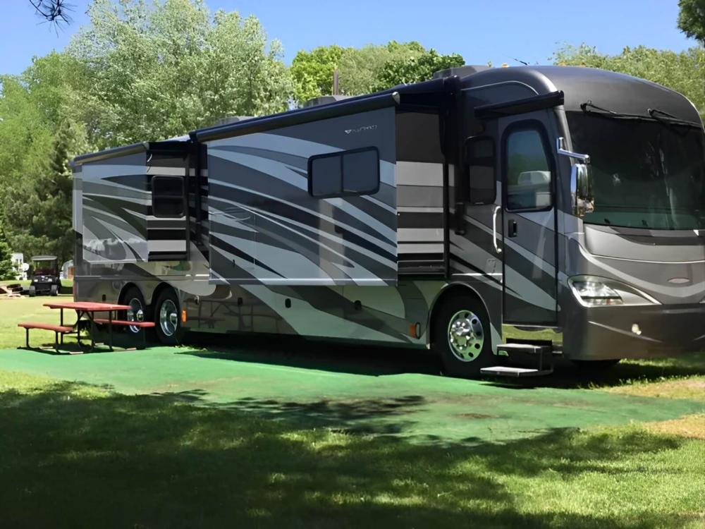 RV parked at site River Bay Camping Resort & Marina