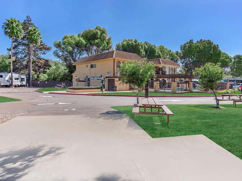 RV lot near building and pool