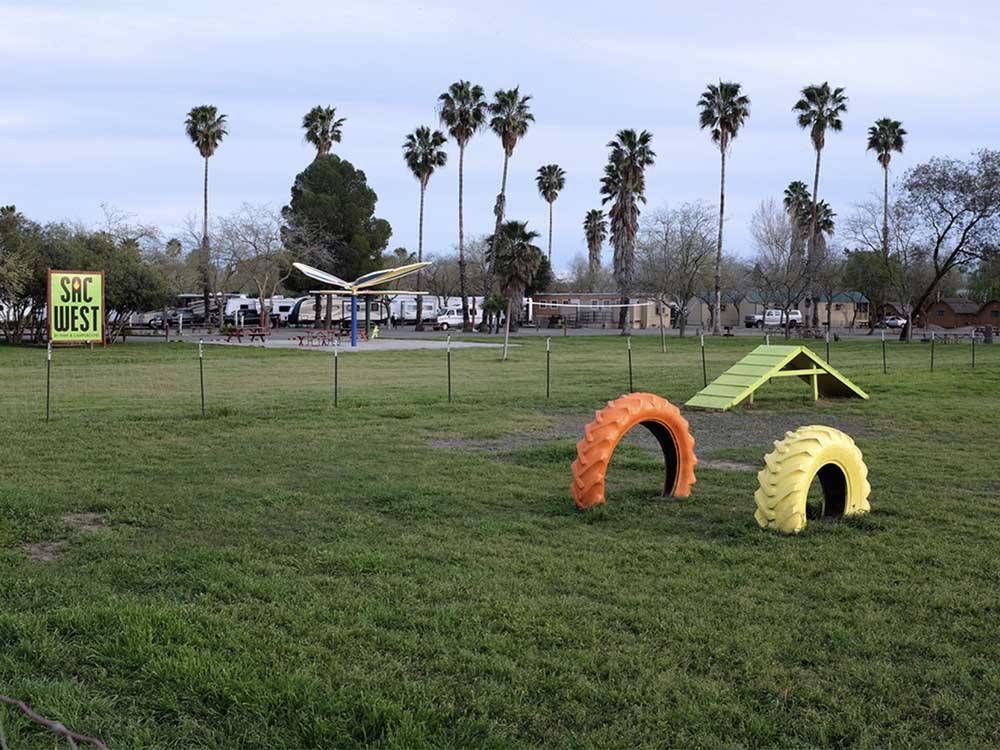 Open area in grassy field at SAC-WEST RV PARK AND CAMPGROUND