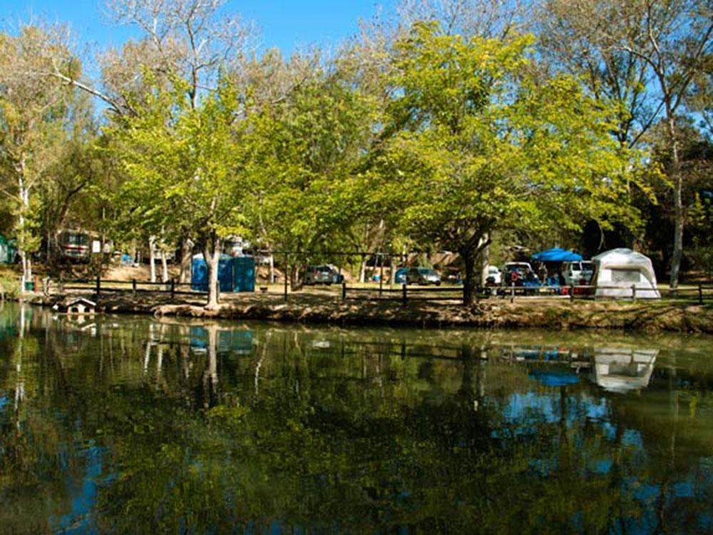 The lake next to the tenting area at WOODS VALLEY KAMPGROUND & RV PARK