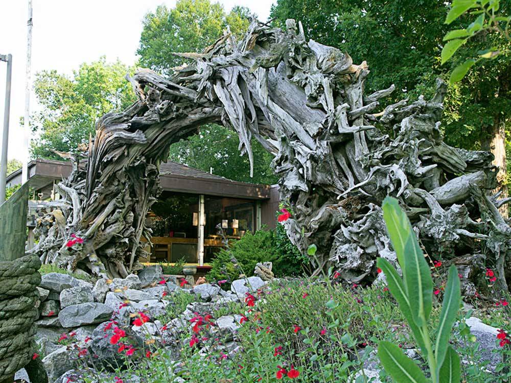 An arch made of driftwood at HOLIDAY TRAV-L-PARK
