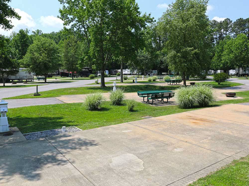 A group of paved RV sites at HOLIDAY TRAV-L-PARK