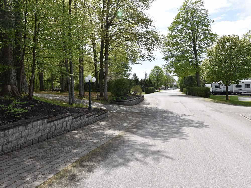 The paved front entrance driveway at WOODLAND PARK