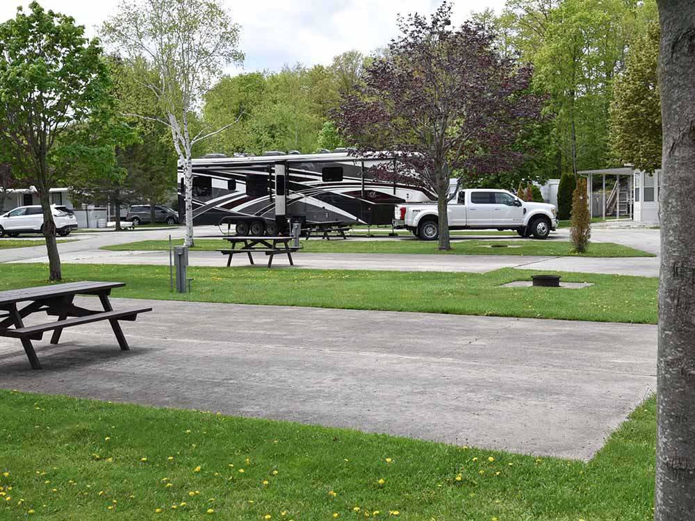 A row of paved RV sites at WOODLAND PARK