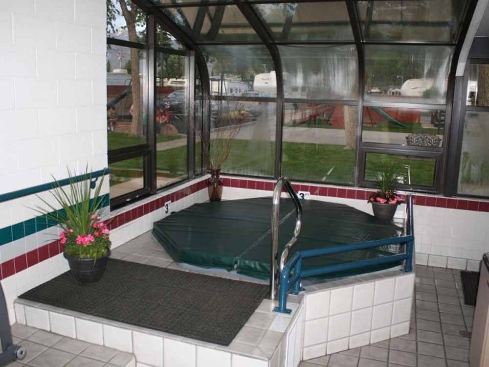 The inside hot tub under glass at MOUNTAIN SHADOWS RV PARK & MHP