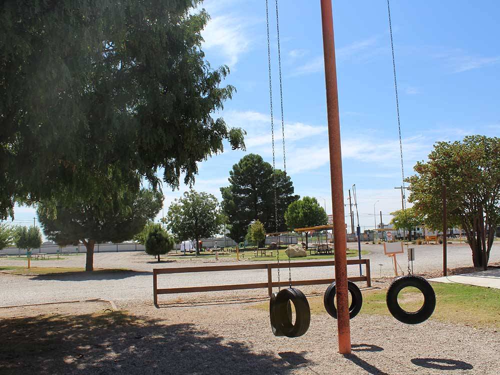 A swing set made out of tires at CARLSBAD RV PARK & CAMPGROUND