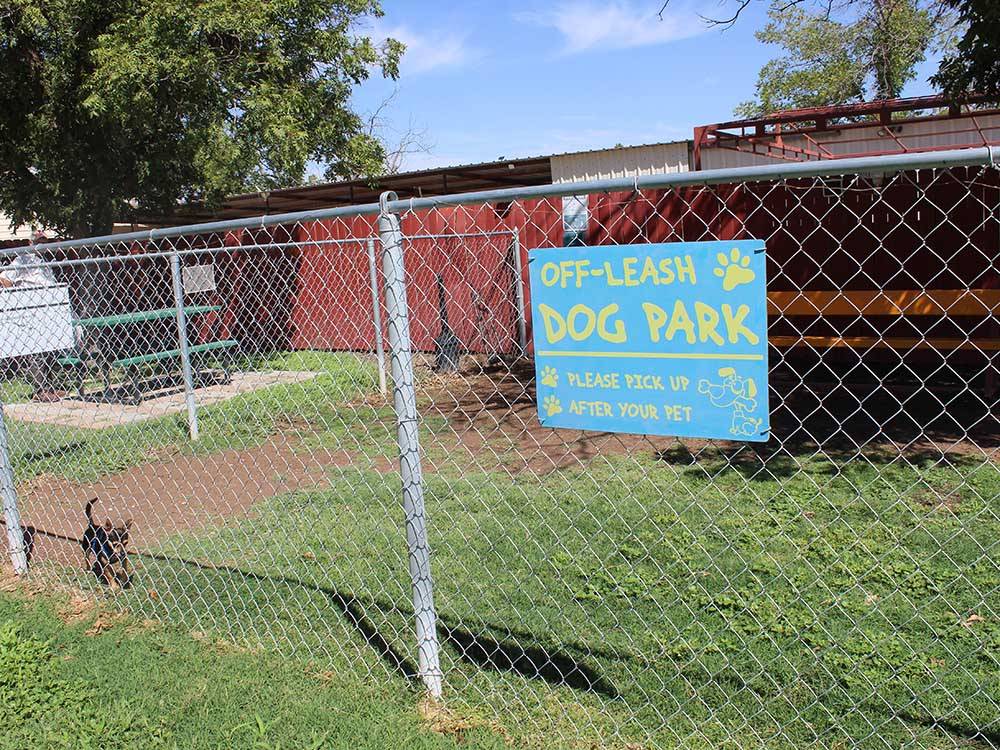 The fenced in dog area at CARLSBAD RV PARK & CAMPGROUND