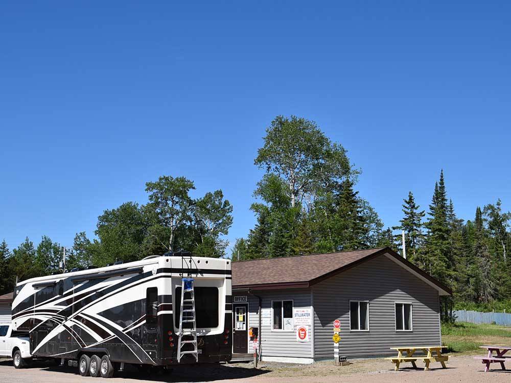 Class A Motorhome parked on-site at STILLWATER TENT & RV PARK