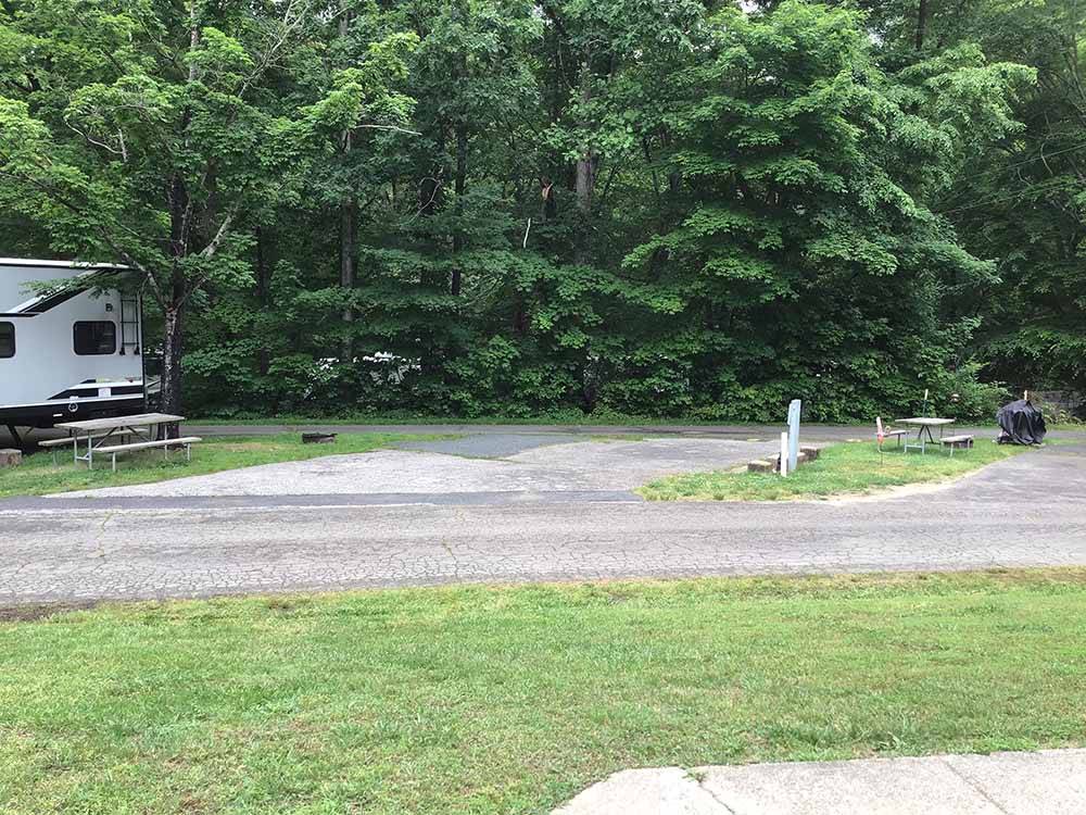 A paved pull thru RV site at PRINCE WILLIAM FOREST RV CAMPGROUND