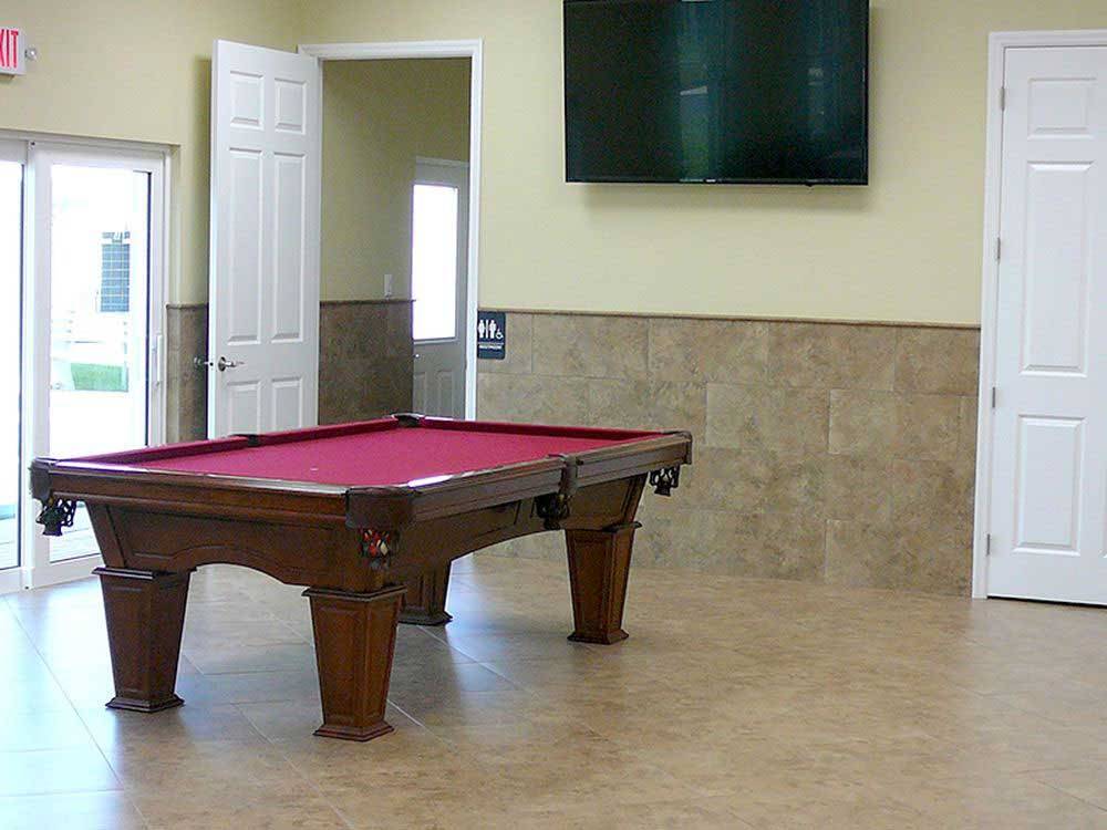Pool table in game room at FLORIDA PINES MOBILE HOME & RV PARK