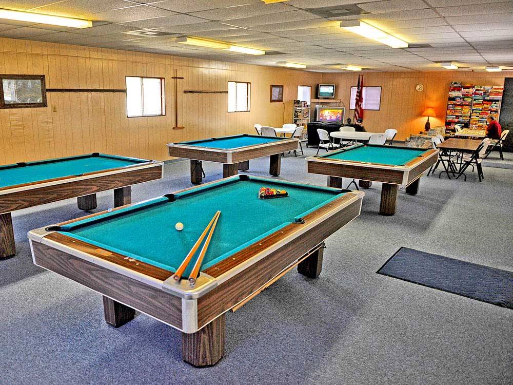 Pool tables in game room at ENCORE PARADISE PARK