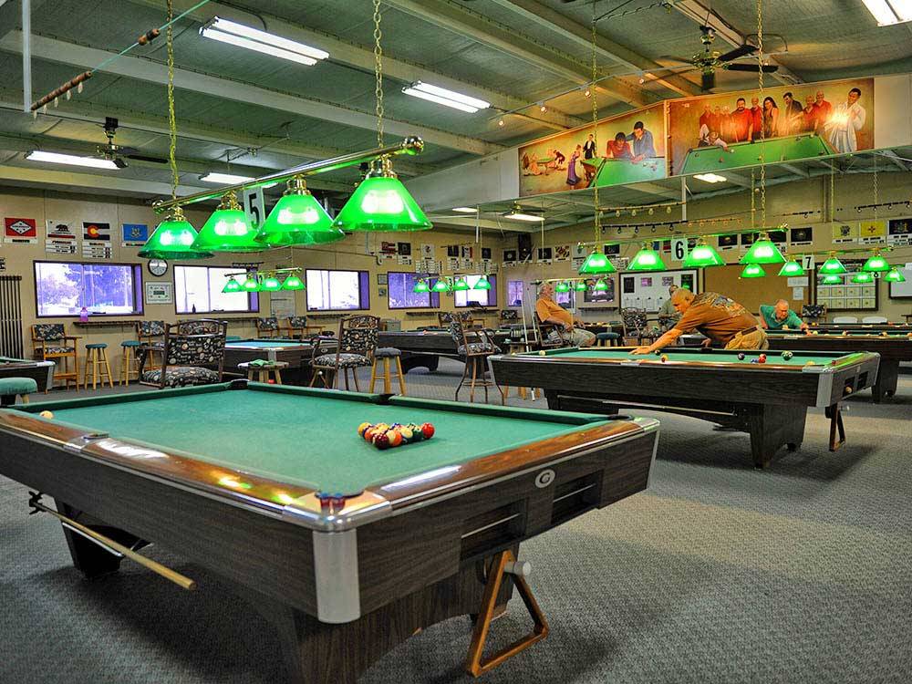 Pool tables in game room at ENCORE FUN-N-SUN