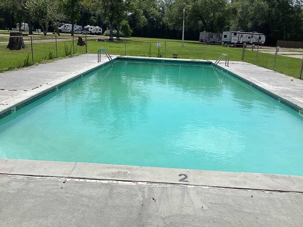 The fenced in swimming pool at Vinton RV Park